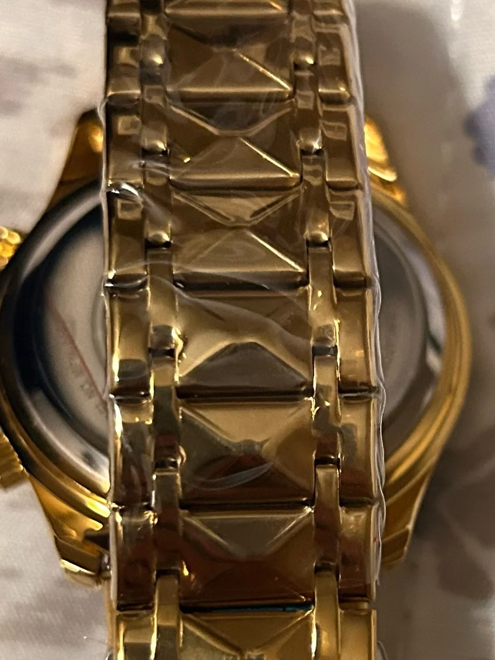 Gold Men's Chronograph Watch with Blue Accents